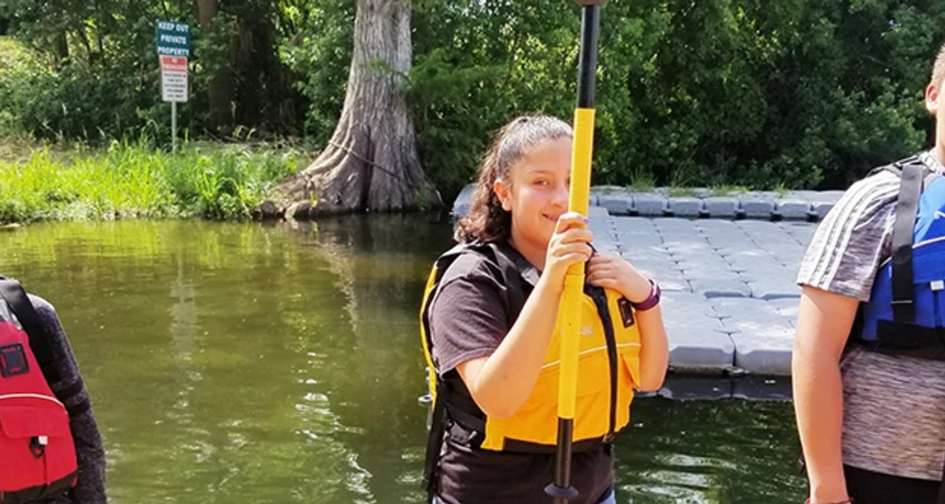 Teens getting ready to go kayaking